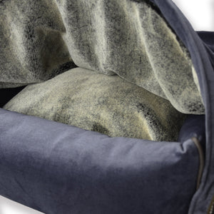 KONA CAVE® ultimate luxury snuggle dog cave bed in grey velvet and lined in super soft, human-grade faux-fur. Gifts for spoiled dogs and cats. Most luxurious and warmest pet bed.