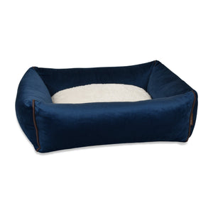 KONA CAVE® luxury cozy dog cave bed in blue velvet. Patented design has sturdy rectangular base and arched canopy cover.