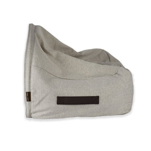 KONA CAVE® luxury dog and cat snuggle cave bed in cream herringbone. The back of the canopy cave covers lies on the bed to snuggle pets like a blanket.