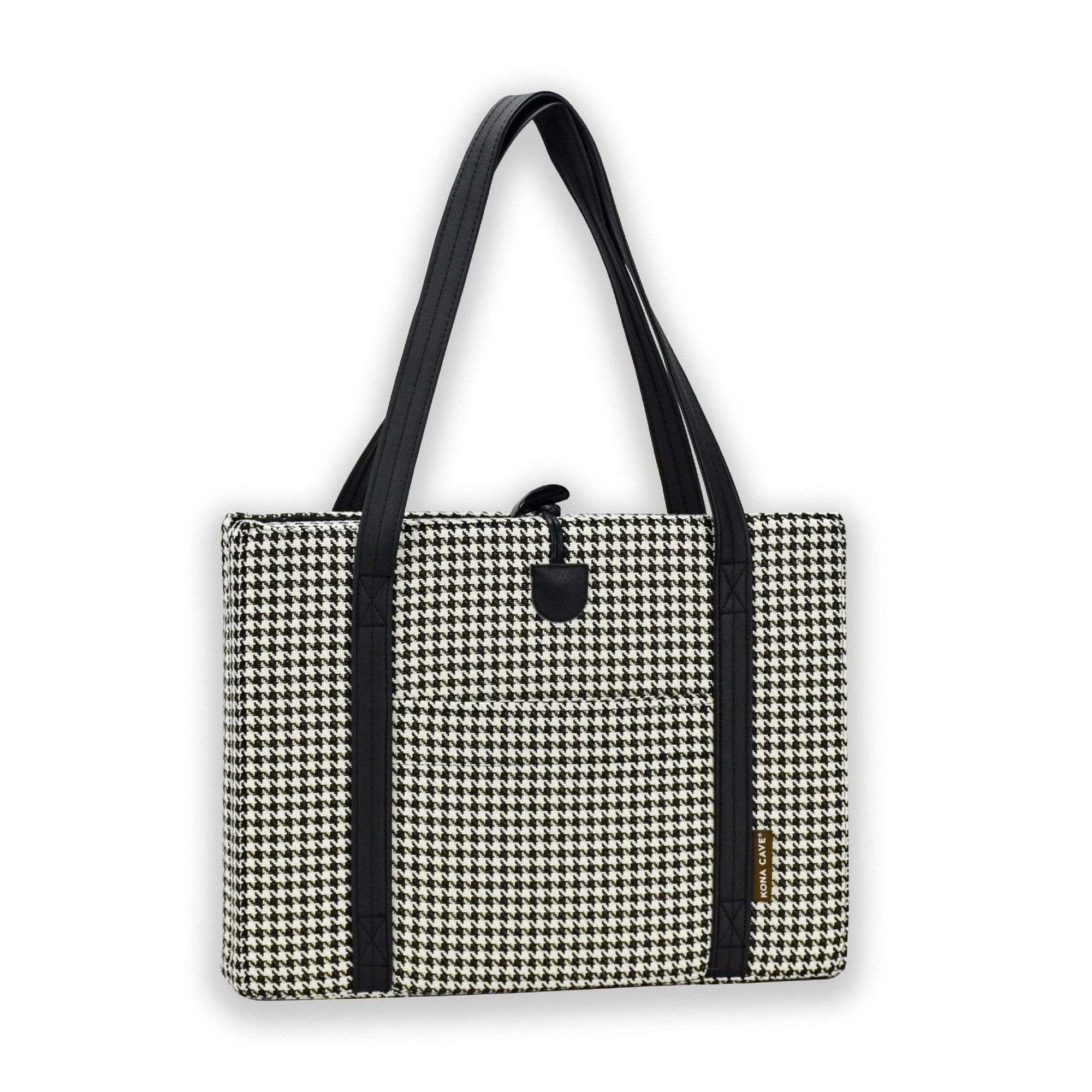 Front view of KONA CAVE® luxury Travel Dog Bed in Black and White Houndstooth with black faux suede lining, with front pocket. Portable folded dog mat with leather shoulder straps, and toggle closure for restaurants, pubs and hotels. 