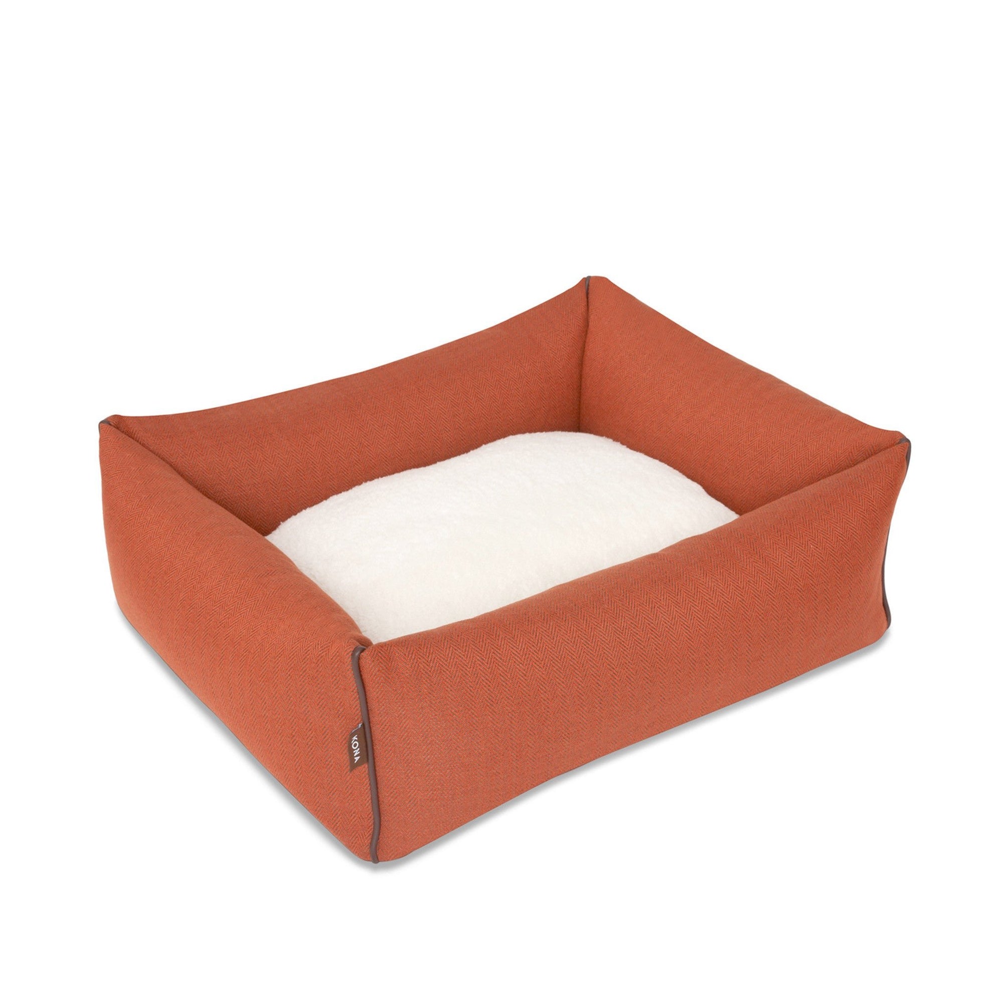 KONA CAVE® designer dog bed in elegant orange herringbone fabric with leather trim.