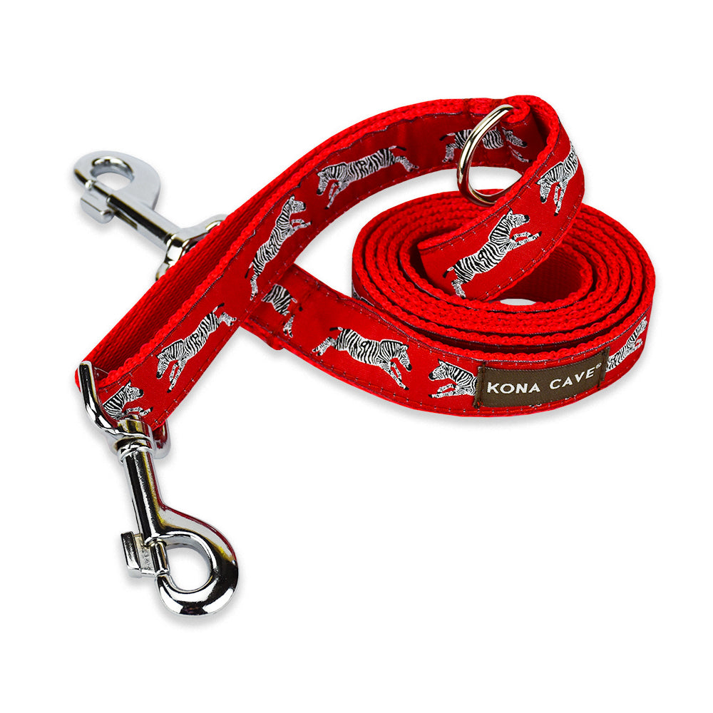 KONA CAVE® Adjustable dog leash. Zebras with red ribbon on red nylon leash.  Extra Clip  and D-rings to shorten leash or attach poop bags, etc. Light weight and comfortable.
